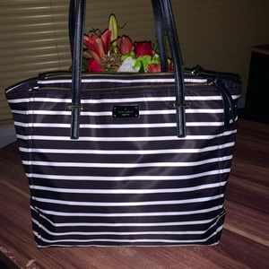 Black and white stripped Kate spade tote in excellent condition, barely used